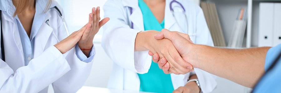 Physicians shaking hands