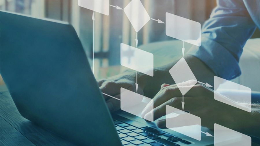 Man typing on a computer