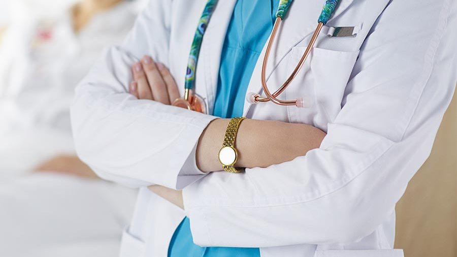 Doctor and physician assistant talking