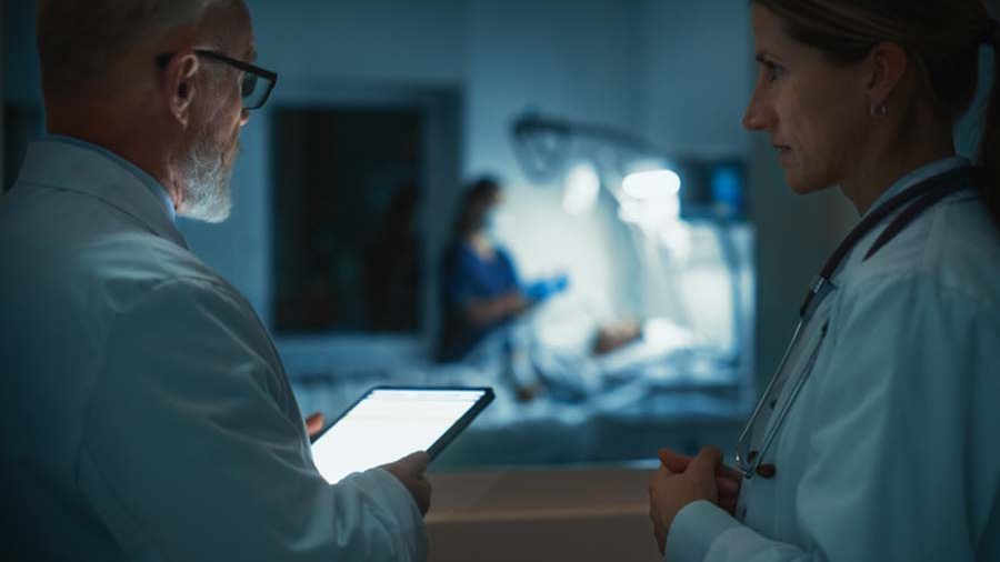 Doctors observing a patient
