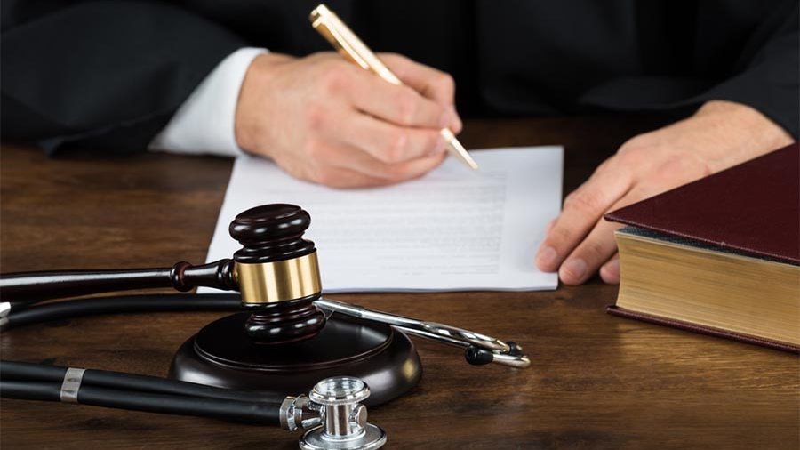 A court judge with gavel and stethoscope