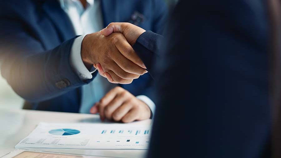 Consultants shaking hands