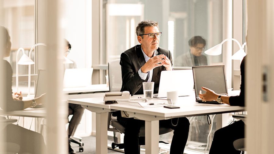 business consultant working at a desk