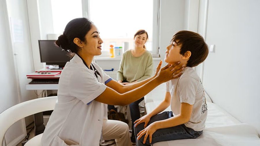 Pediatric nurse and child