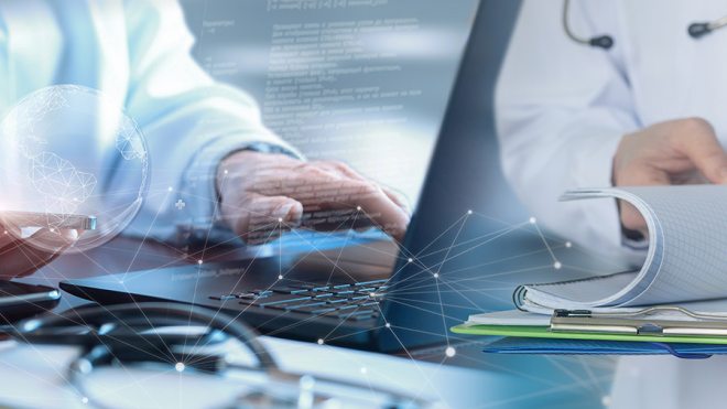 Doctor on a computer