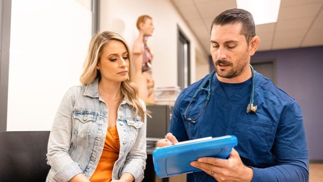 Doctor talking to a patient