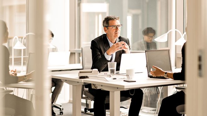 business consultant working at a desk