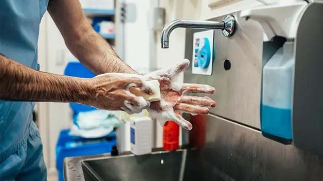 Doctor washing hands