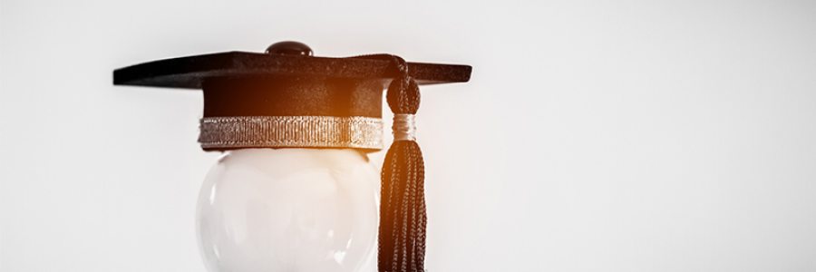 Light bulb and graduate hat