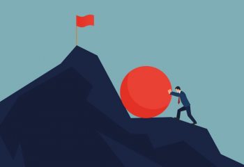 Businessman Pushing The Heavy Ball To Uphill