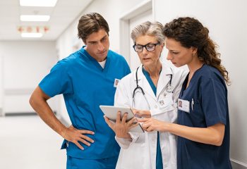 Doctor talking with non-physician providers