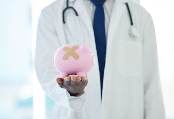 Piggy bank and doctor