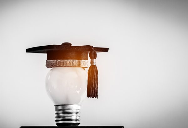 Light bulb and graduate hat